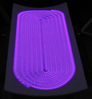 A new ‘diffuse coplanar surface barrier discharge’ (DCSBD) plasma source (pictured) that rapidly cleans flat polymer sheets in open-air conditions holds great promise for roll-to-roll manufacturing.